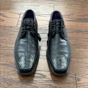 Mezlan black alligator cap toed dress shoes.
